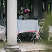 Load image into Gallery viewer, The Catherine Block Print tablecloth in outdoor setting
