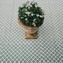 Load image into Gallery viewer, Green pietronella Indian block print tablecloth with urn of flowers
